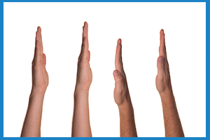 four childrens hands up, on a white background