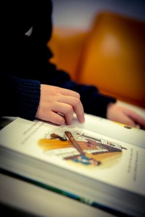 child reading a book